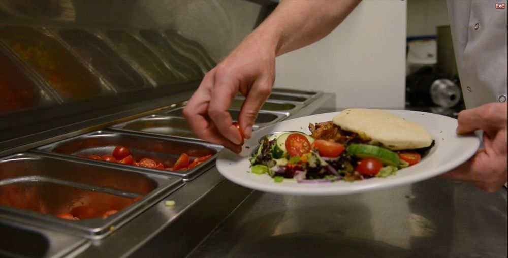 Portrush Adelphi 호텔 외부 사진 A salad being prepared at a salad bar